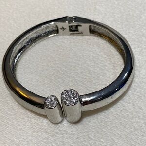 BCBG rhinestone and silver toned bracelet